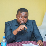 The Acting Director of the Journalists Accreditation Board (JAB) contributes during the dissemination session for regulators in Dar es Salaam.